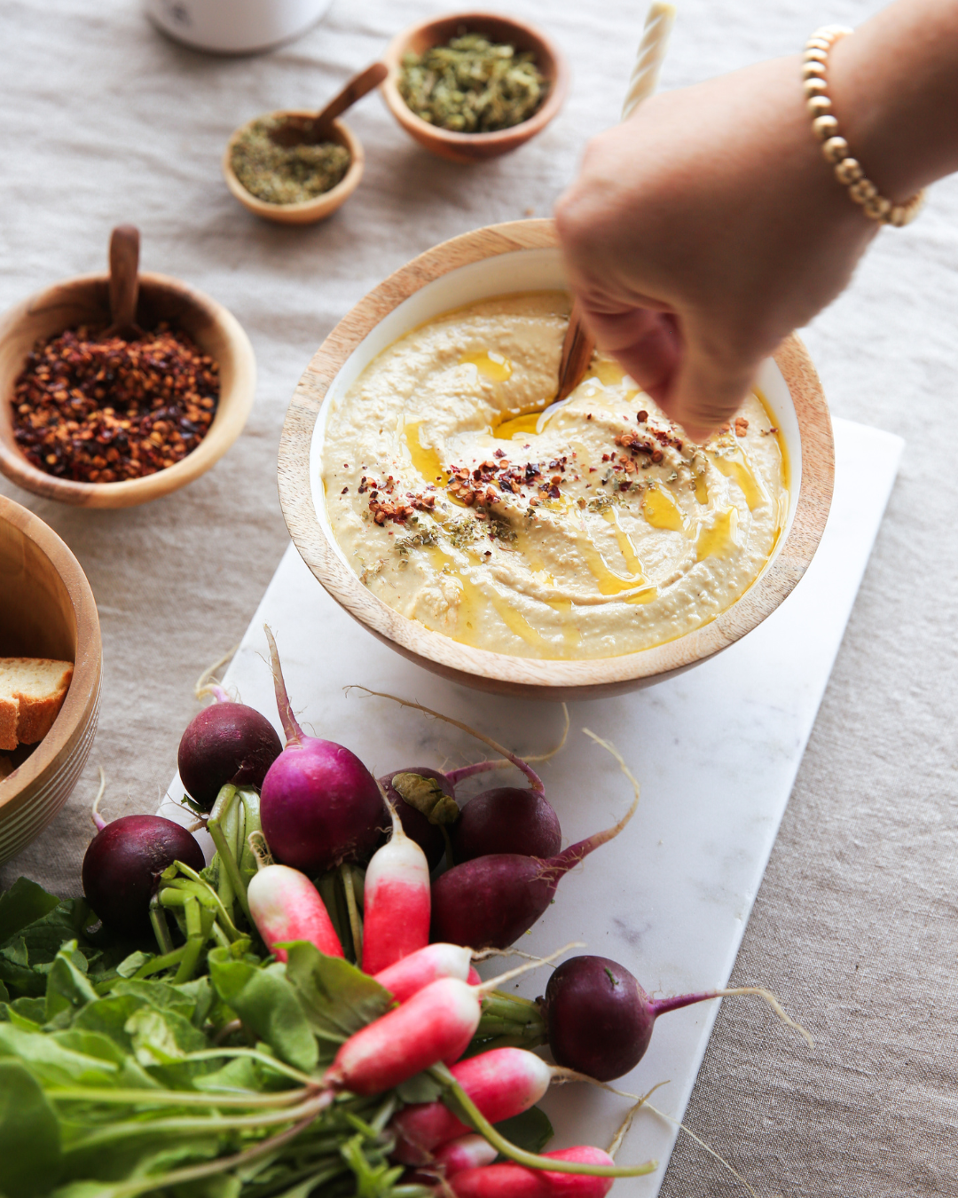 Easy Greek cooking recipe of hummus with olive oil dripped on top.