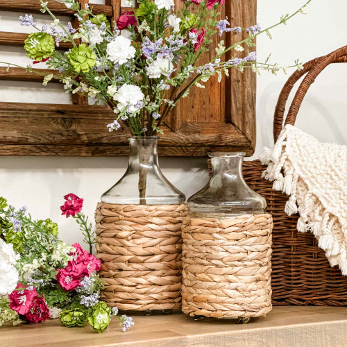 Seagrass Glass vase with wicker encasing with florals coming out