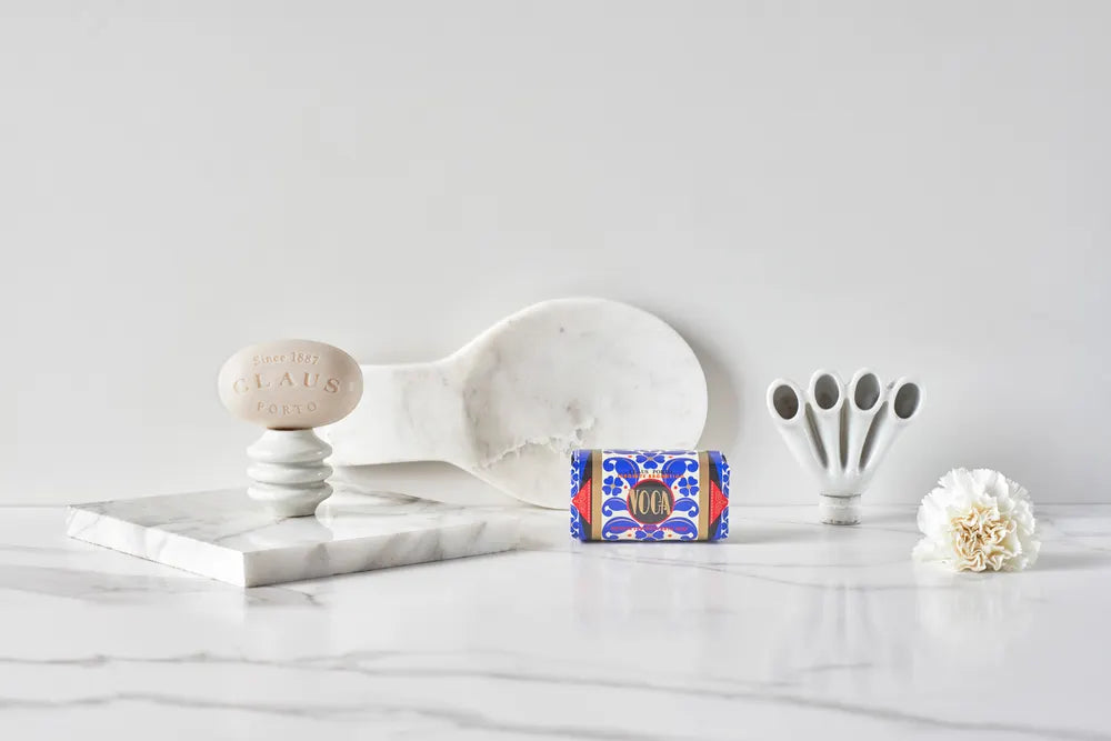 Claus bar of soap collection on a marble vanity top