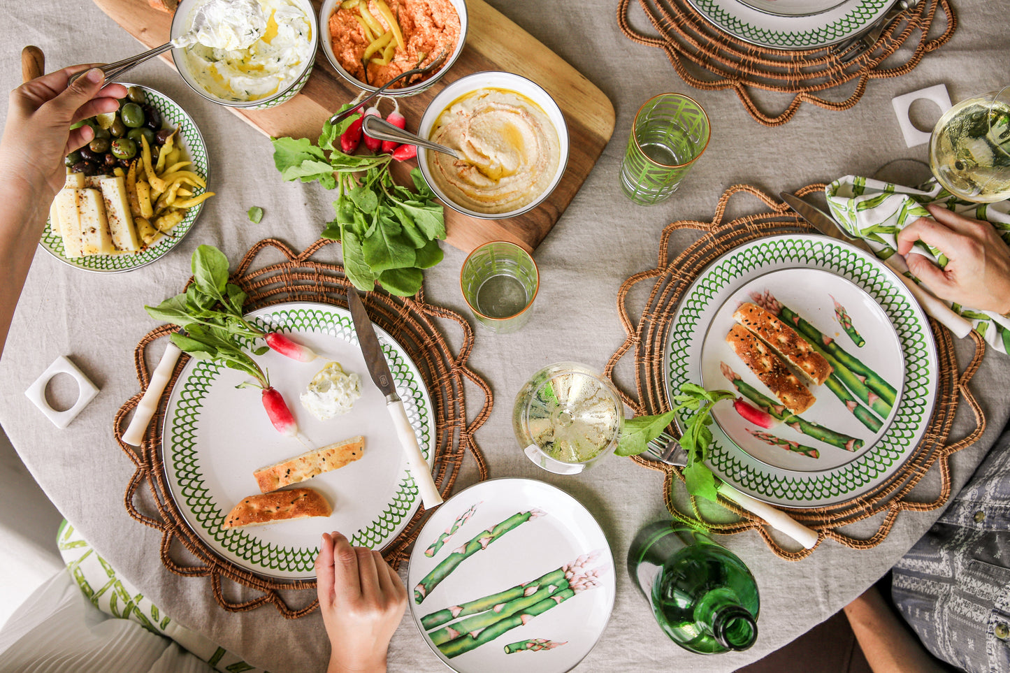 Elegant Mediterranean table setting featuring artisan luxury kitchenware from Mrs. Mandolin