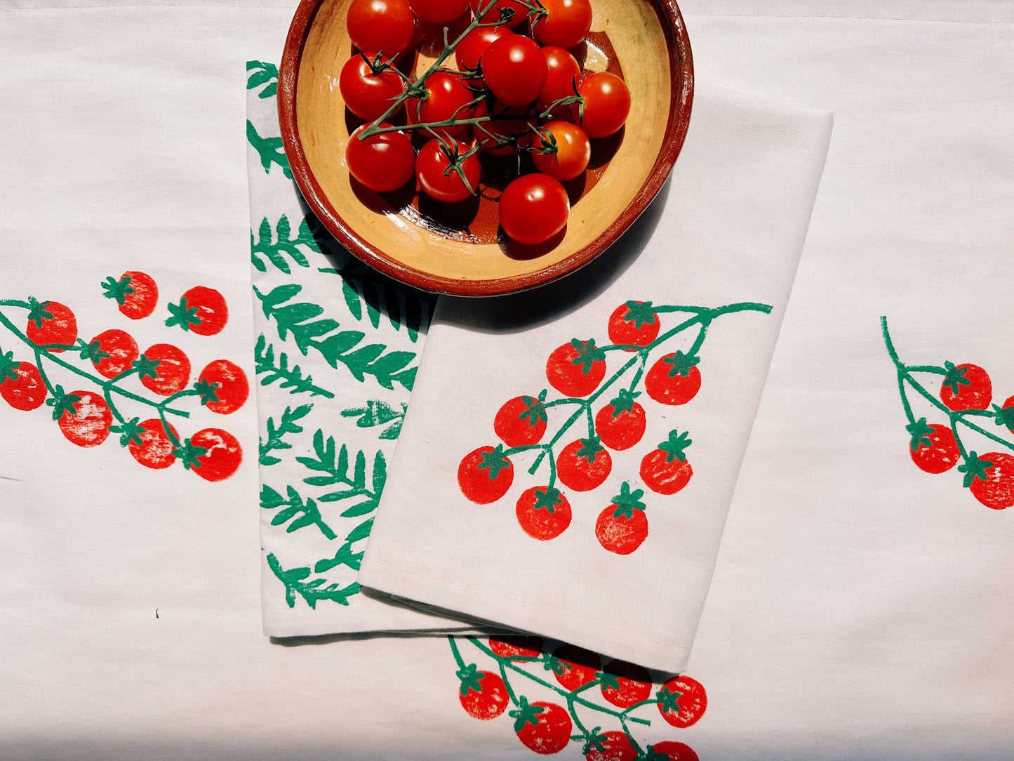 Tomatoes on White Dinner Napkins