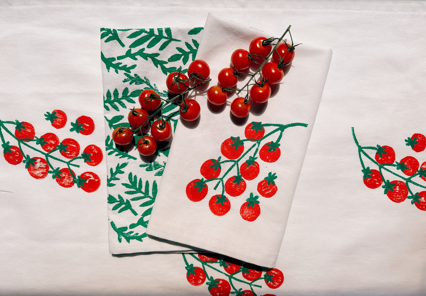 Tomatoes on White Dinner Napkins