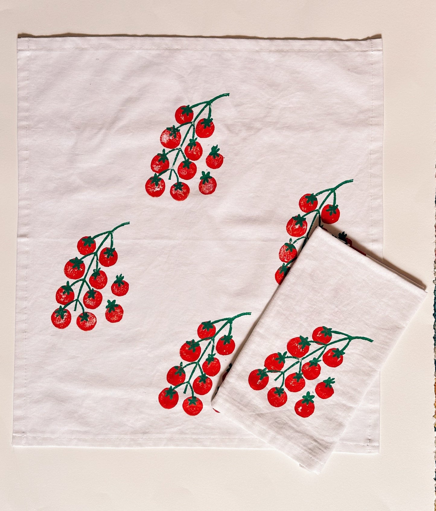 Tomatoes on White Dinner Napkins