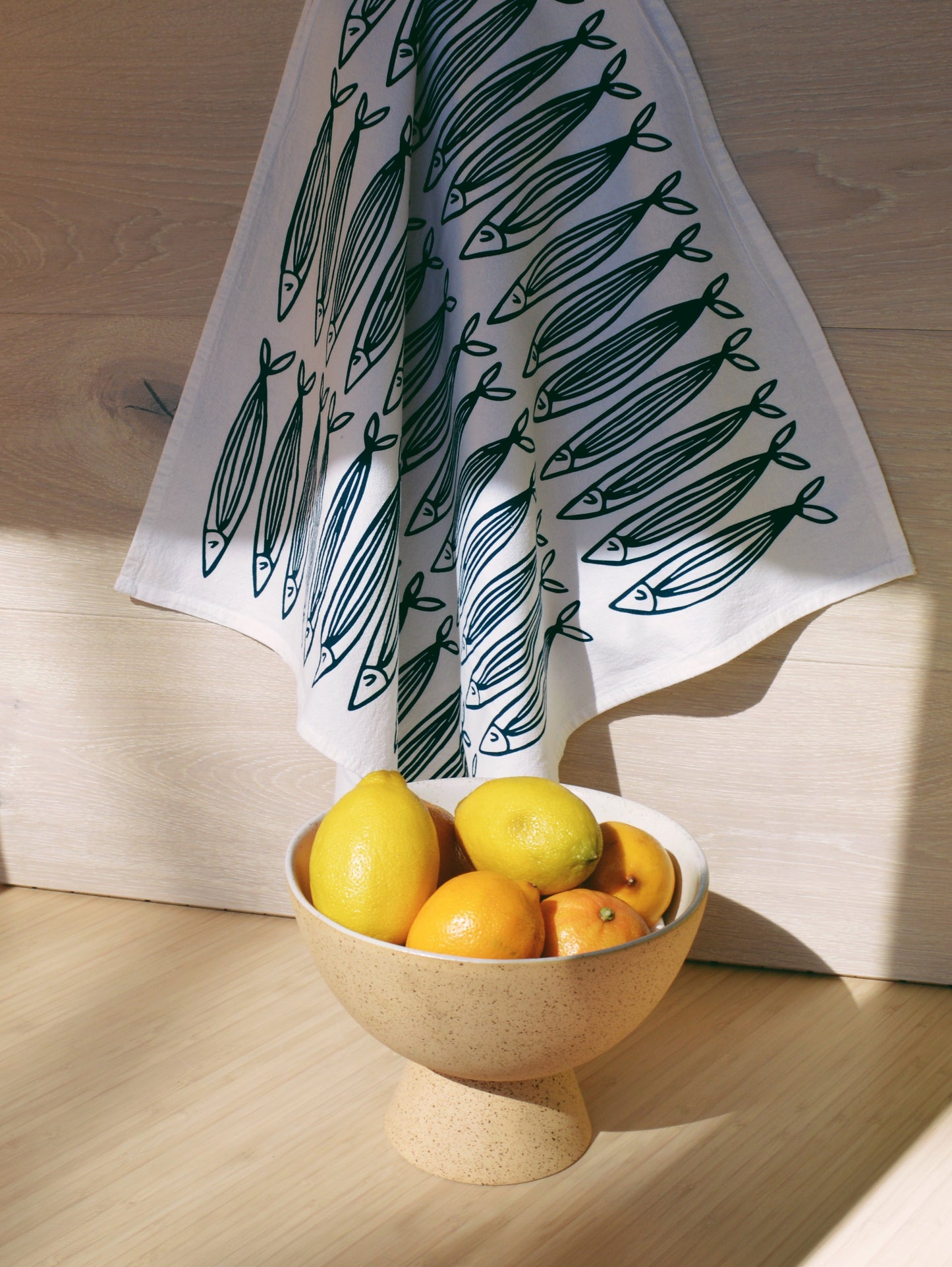 Sardines on White Tea Towel