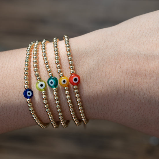 Load image into Gallery viewer, Thin Gold Beaded Flat Evil Eye Bracelet
