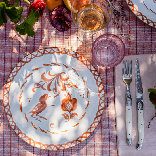 Dinner plate with hand painted designs