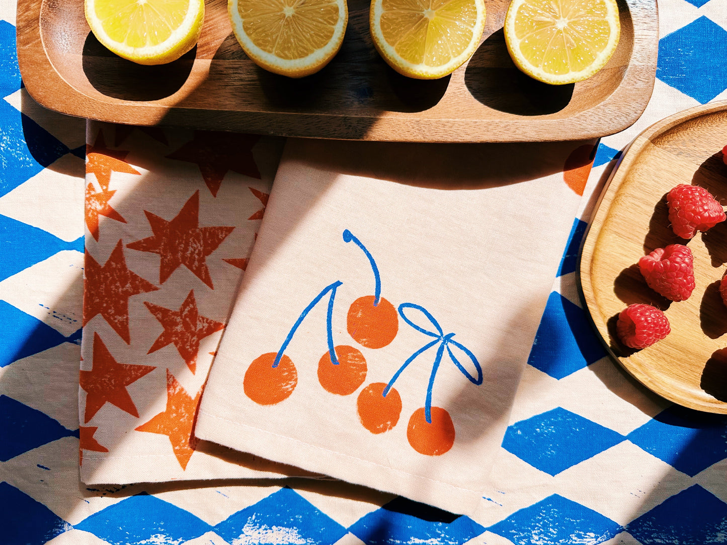 Orange Cherry on Blush Dinner Napkins