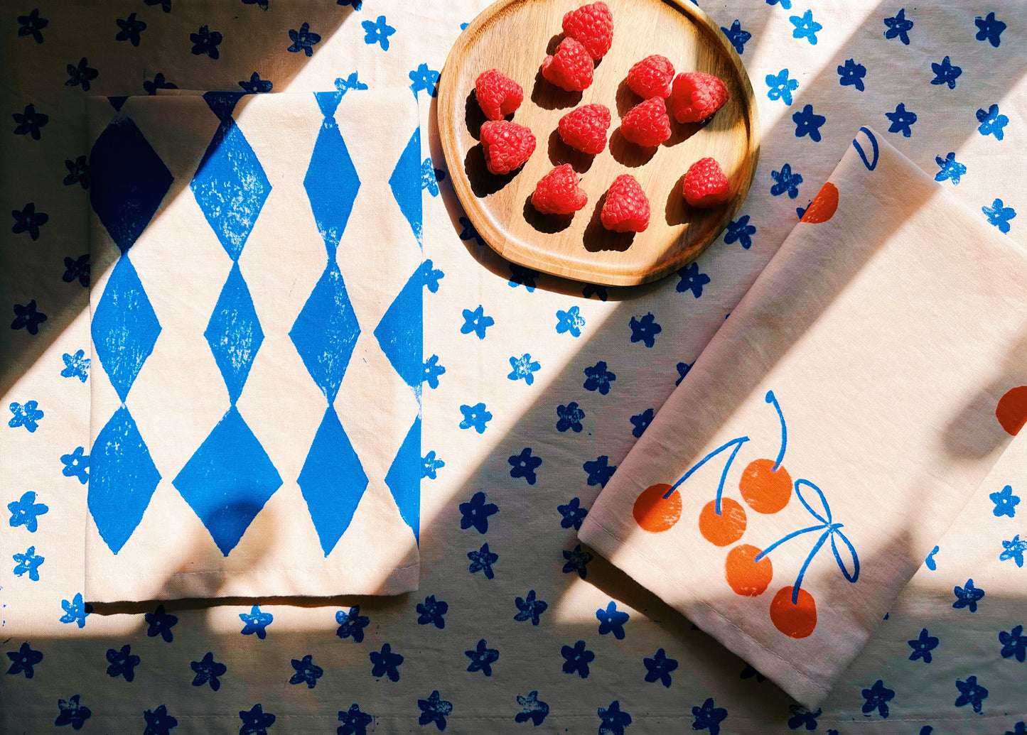 Orange Cherry on Blush Dinner Napkins