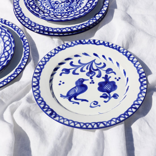 Dinner plate with hand painted designs